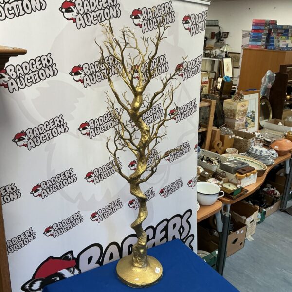 Gold wishing tree sculpture for tabletop decoration.