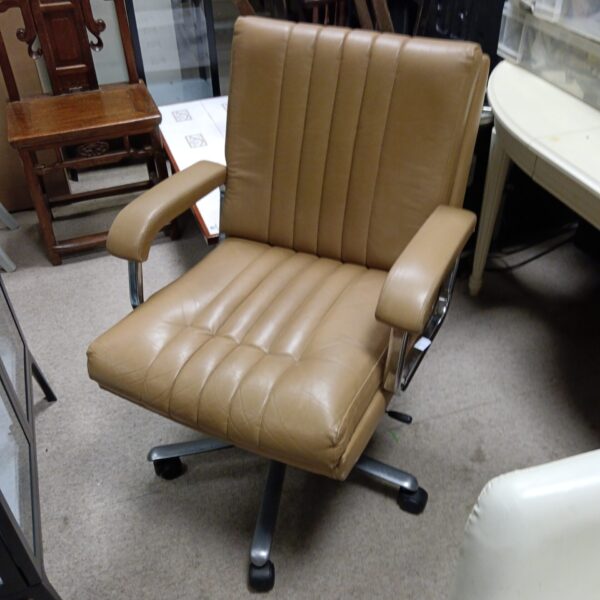 Tan leather Gordon Russell Verco chair, mid century modern design.
