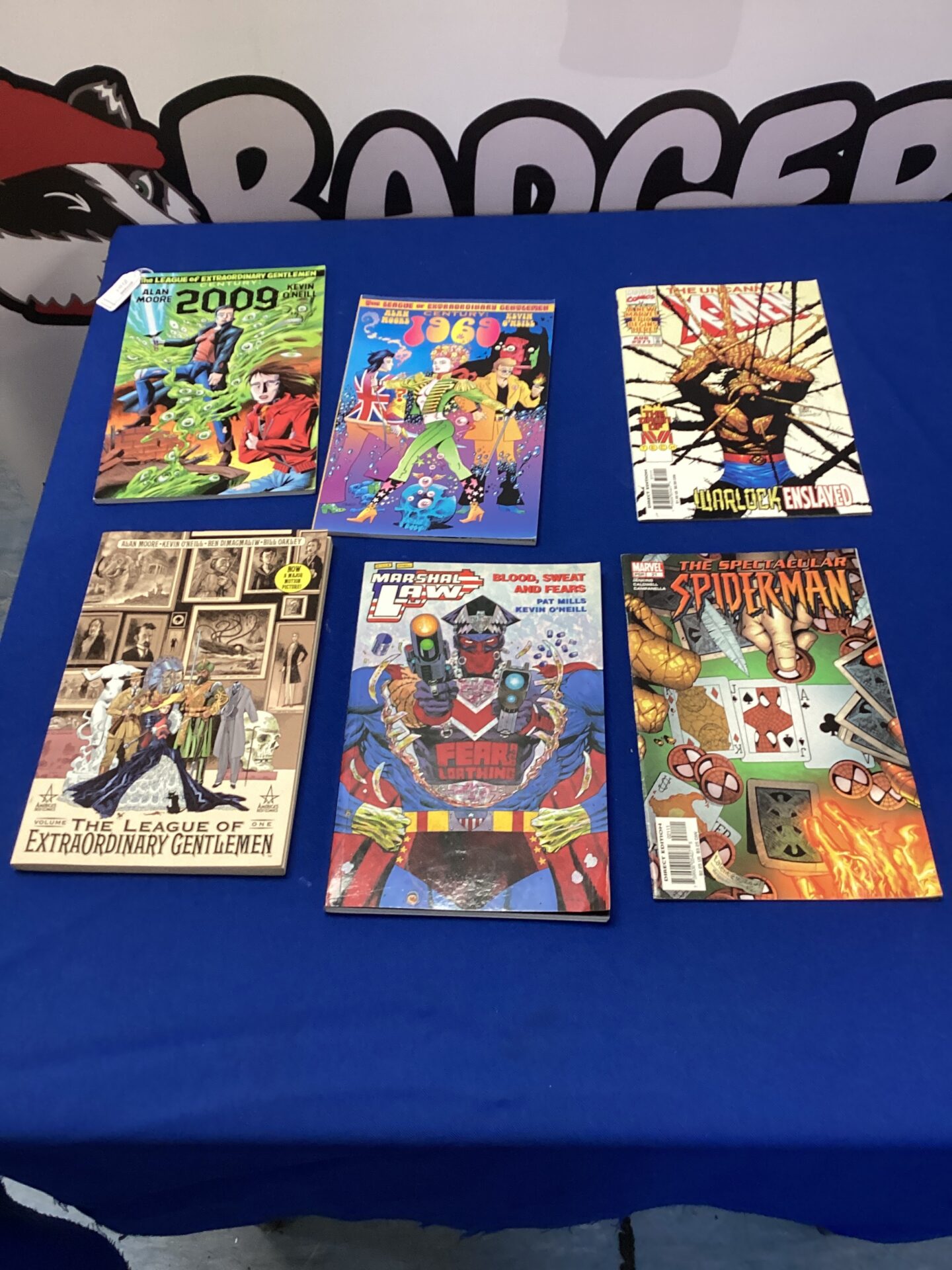 Graphic comic bundle featuring Marvel and League of Extraordinary Gentleman comics.