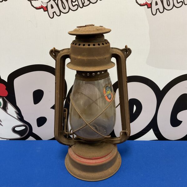 Vintage Gremlin hurricane lantern with clear glass globe.