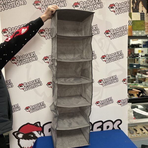 Grey fabric wardrobe organiser for closet storage.