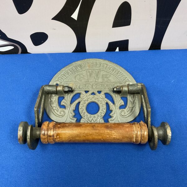 Vintage cast iron GWR loo roll holder for railway enthusiasts.