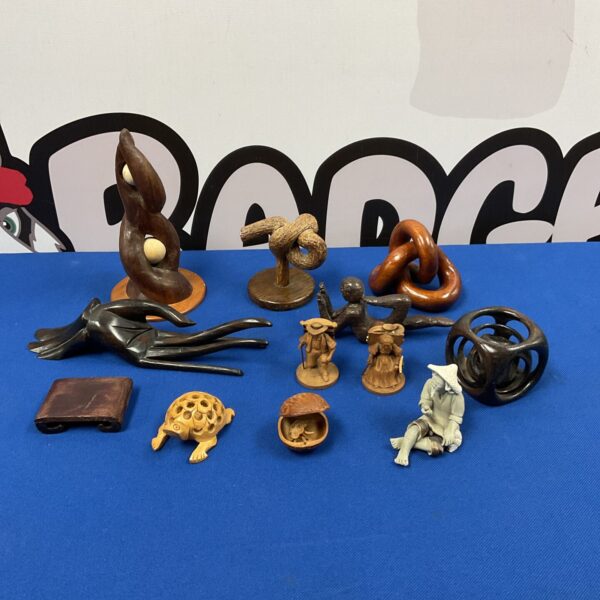Hand carved wooden tortoise and miniature travellers, folk art collectible.
