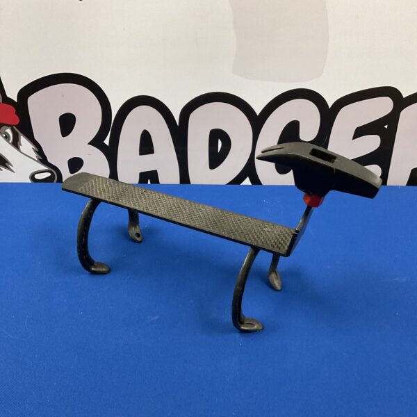 Handmade doorstop crafted from reclaimed hammer, file, and horseshoes.