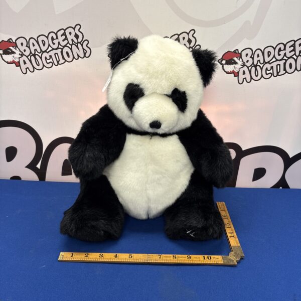 Vintage Harrods 1993 panda teddy bear in good condition.