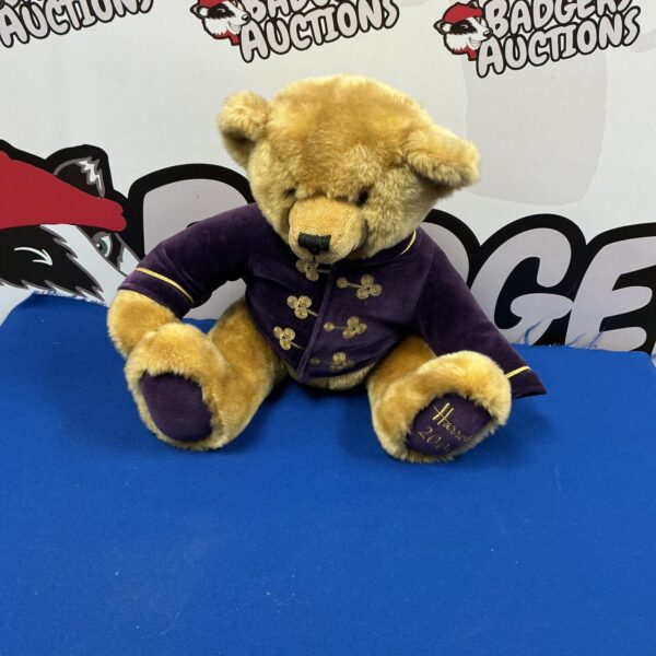 Front view of the Harrods 2000 teddy bear in its uniform.