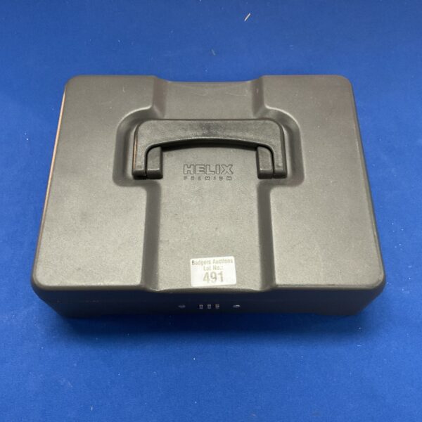 Vintage Helix Premium cash box with model number 0000.