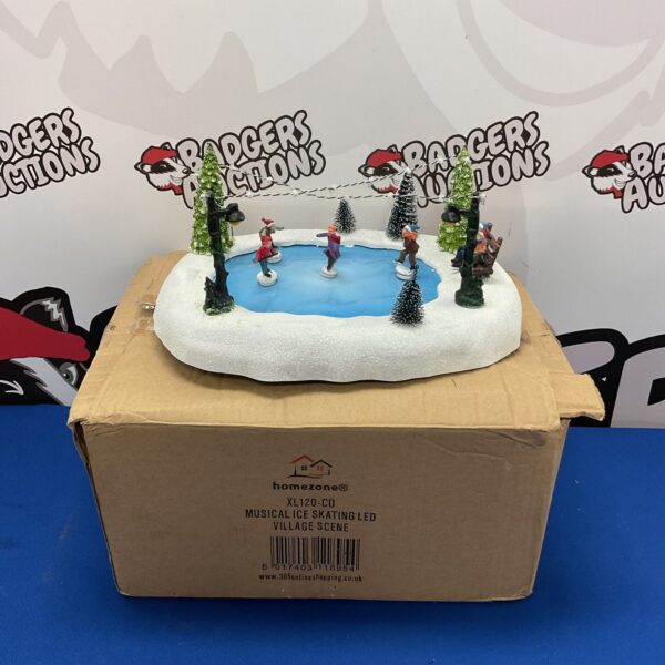 Homezone musical ice skating village with LED lights and skaters.