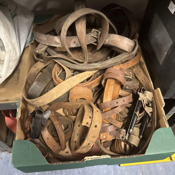 Lot of vintage horse leather straps for equestrian use.