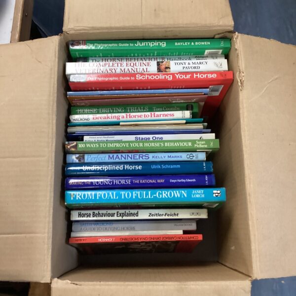 Lot of vintage horse training books for equestrian enthusiasts.