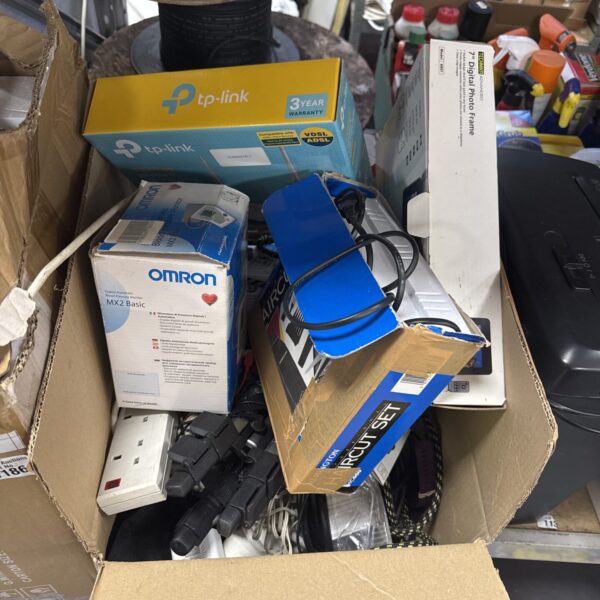 Mixed house clearance lot with networking equipment and cables.