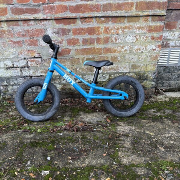 Blue Hoy children’s push bike for learning balance.
