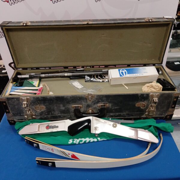 Open case displaying a Hoyt compound bow and archery accessories.