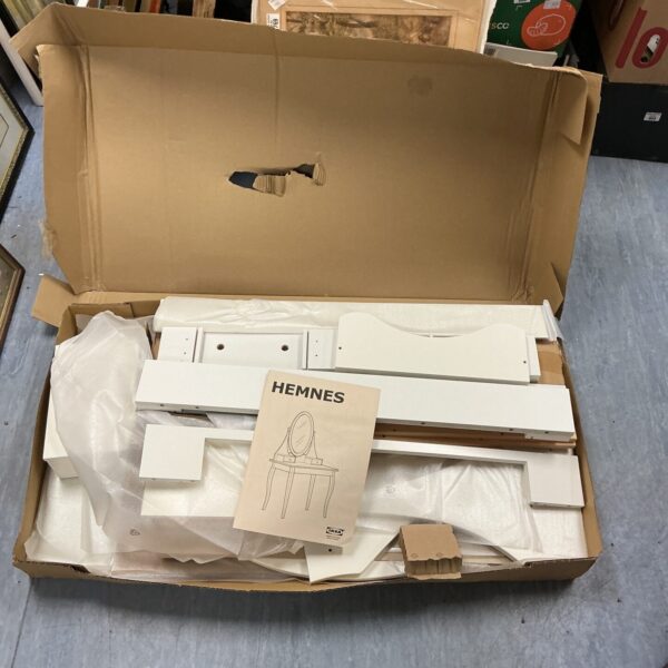 Unopened flat-packed IKEA white dressing table in box.