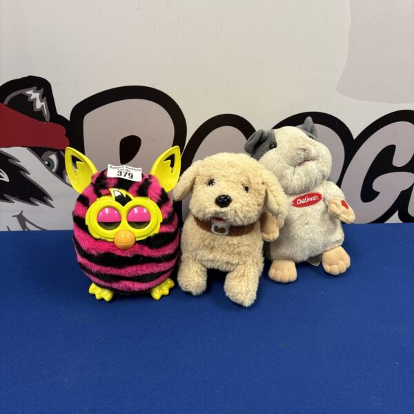 Interactive Furby, Tobar dog, and Chatimals hamster toy lot.