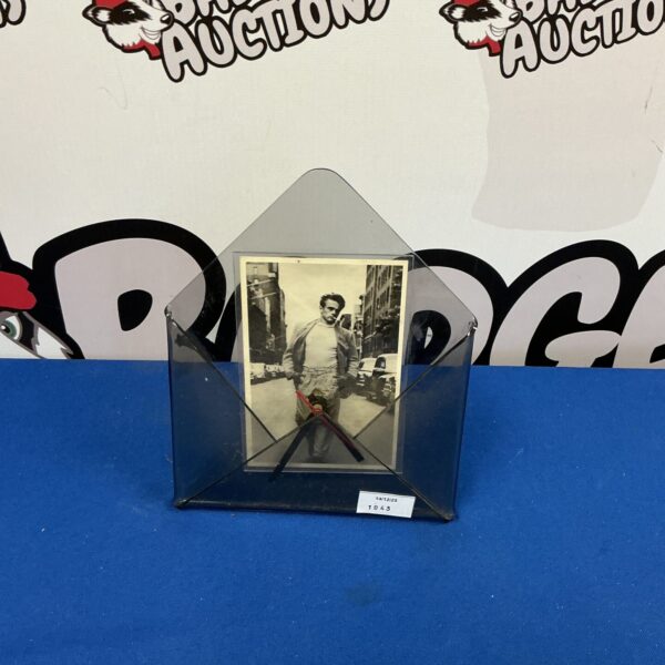 Vintage James Dean postcard clock, a collectible Hollywood memorabilia item.
