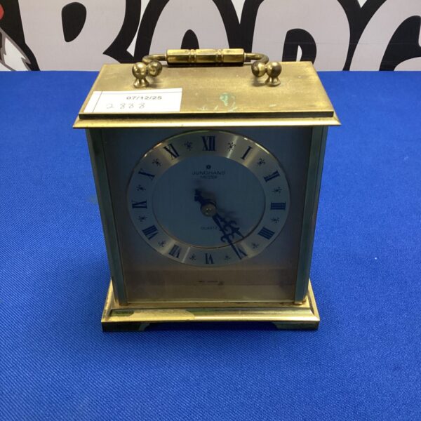 Vintage Junghans quartz mantle clock with gold case.