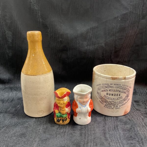 Vintage Keiller marmalade stoneware bottle with character jugs.