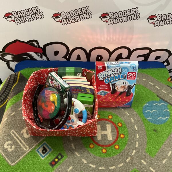 Brightly coloured kids bingo game box with game components visible.