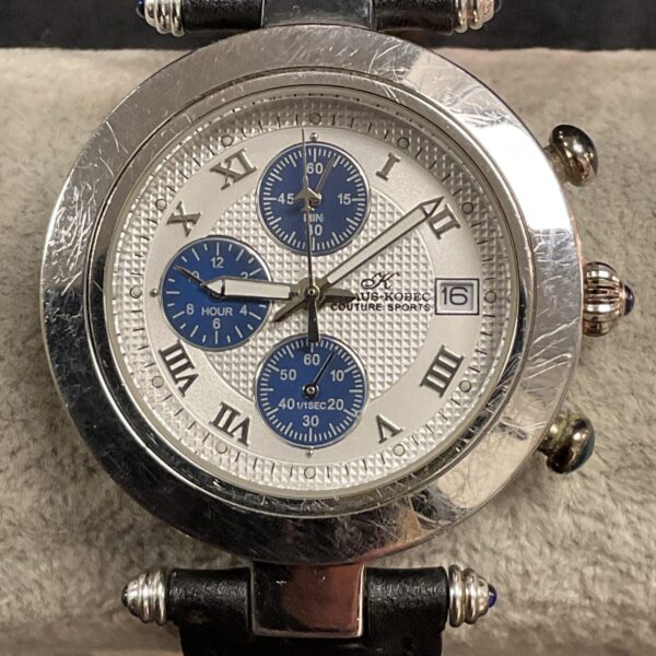 Klaus Kobek couture sports quartz wristwatch with Roman numerals.