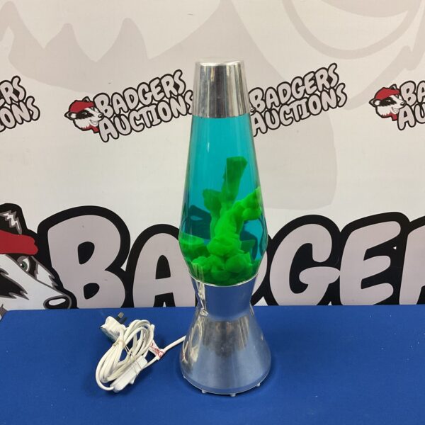 Large green lava lamp with flowing wax, retro 1960s style.