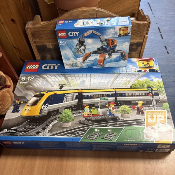 Lego City train sets 60192 and 60197, railway building toys.