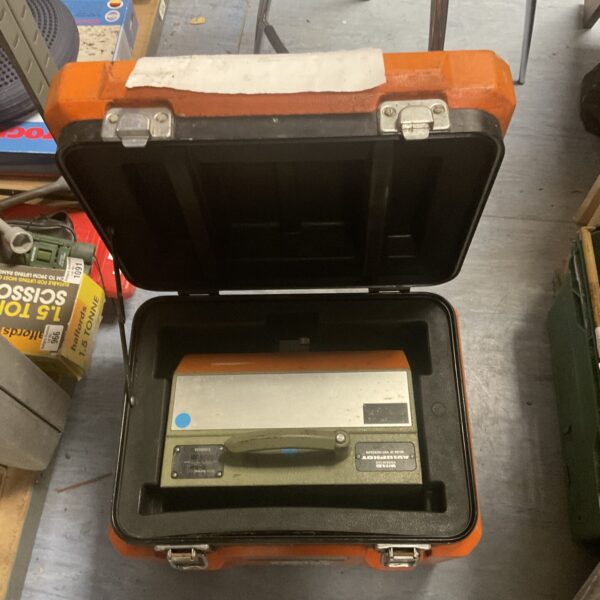 Vintage Leica Wild Aviophot RC10 camera case, open and showing interior.