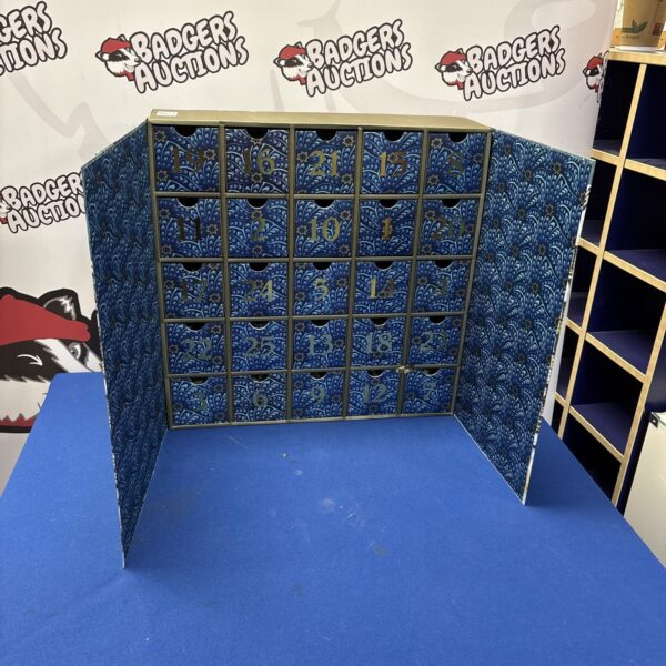 Liberty London advent calendar with patterned fabric pockets.