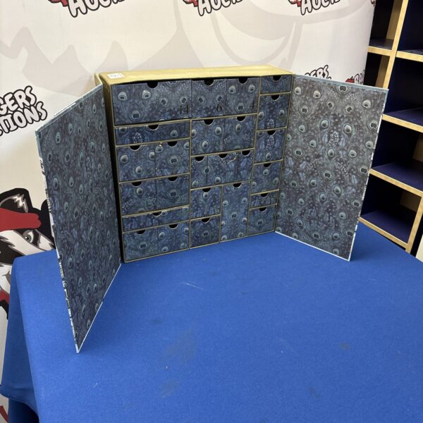 Vintage Liberty London advent calendar with patterned fabric.