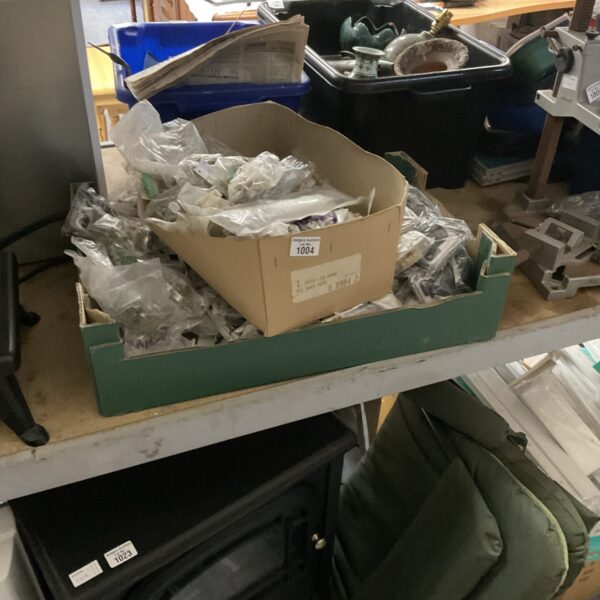 Assortment of vintage and modern light switches and door locks.