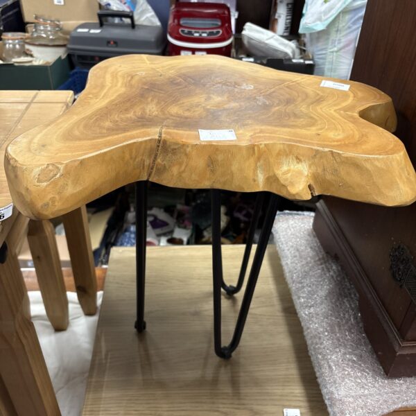 Rustic live edge side table with hairpin legs.