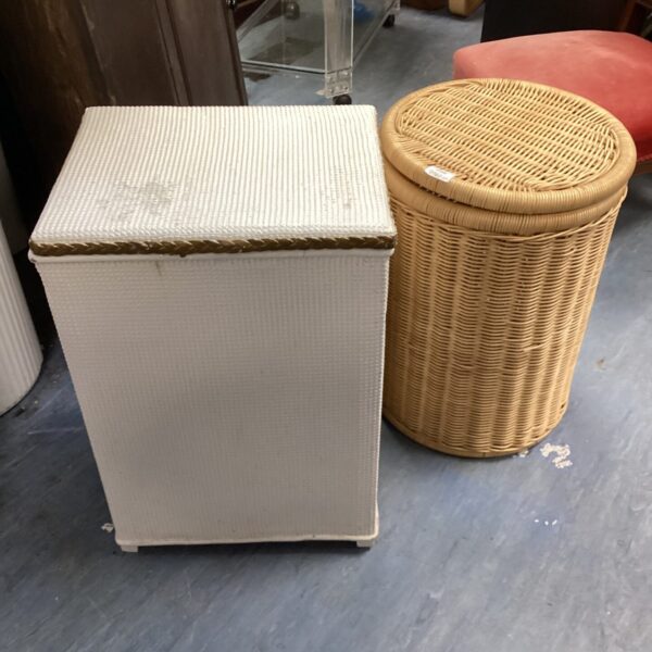 Vintage Lloyd Loom and wicker laundry bin pair for storage.