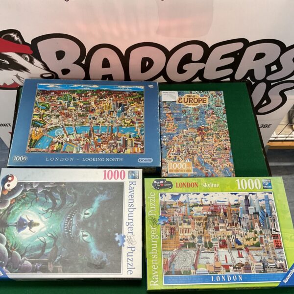 Vintage jigsaw puzzles featuring London and a map of Europe.