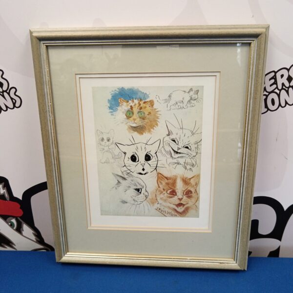Framed Louis Wain cat print with humorous illustration.