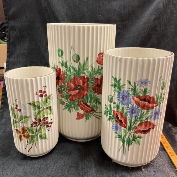 Set of three Lyngby porcelain vases with handpainted floral designs.