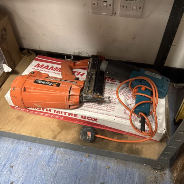 Mammoth mitre saw block with Black & Decker heat gun and Paslode stapler.