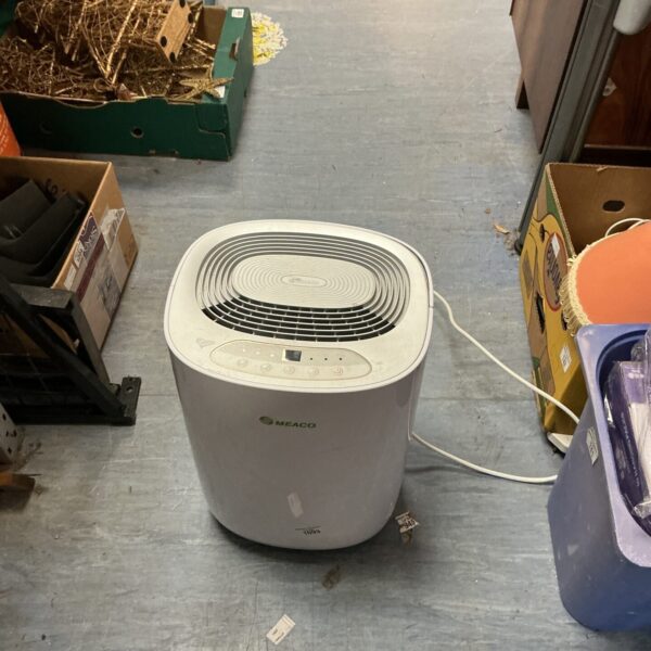 Front view of a white Meaco dehumidifier appliance.