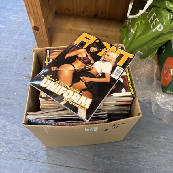 Stack of vintage men's magazines including Loaded, GQ, and Front.