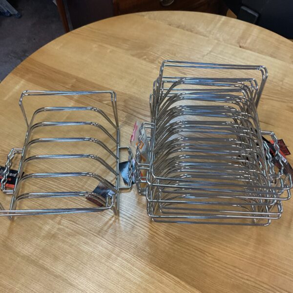Metal rib rack kitchen tray for cooking ribs.