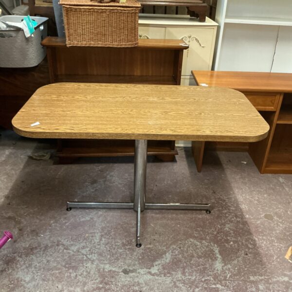 Vintage mid-century modern pedestal table with chrome base.