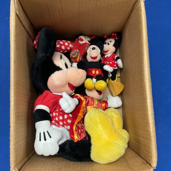 A box of miniature Disney Mouse plushies and keychains.