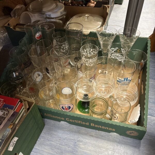 Mixed lot of assorted beer glasses for collectors and pub enthusiasts.