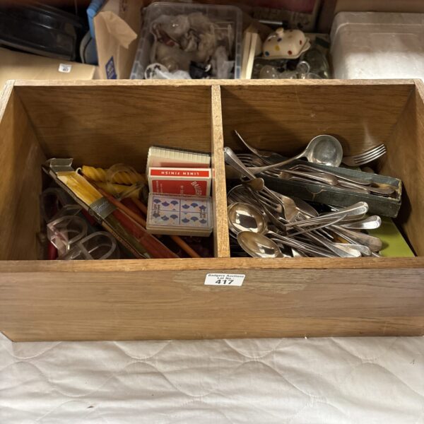 Mixed cutlery lot with stainless steel and silver plated pieces.