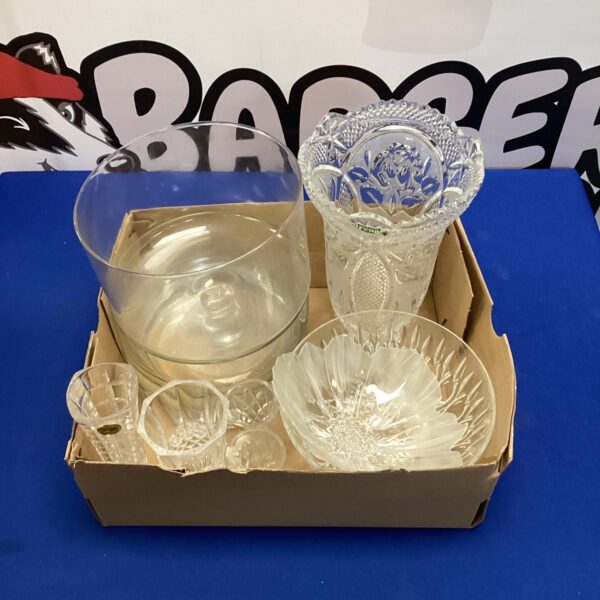 Assorted mixed glassware lot including bowls and vases.