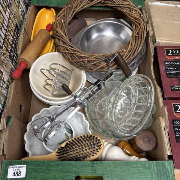 Mixed kitchen lot with glass dishes and metal serving pieces.