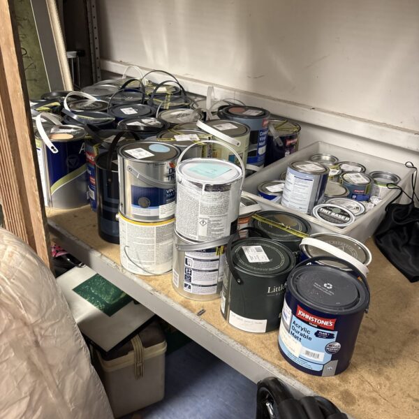 Mixed paint lot featuring Dulux and Lodge containers for DIY projects.