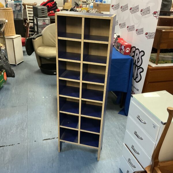 Modern cube storage unit with painted panels and wood frame.