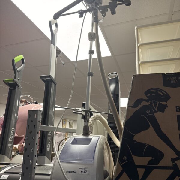 Portable Monster clothes steamer for garment care.