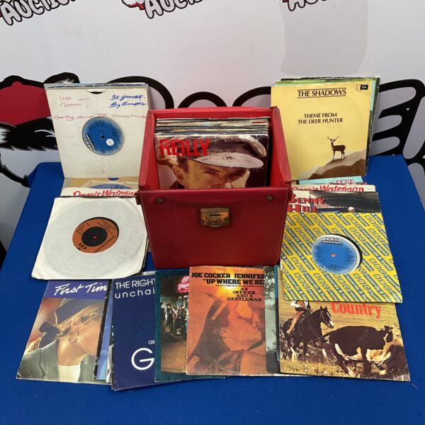 Collection of vintage movie soundtrack singles on vinyl.