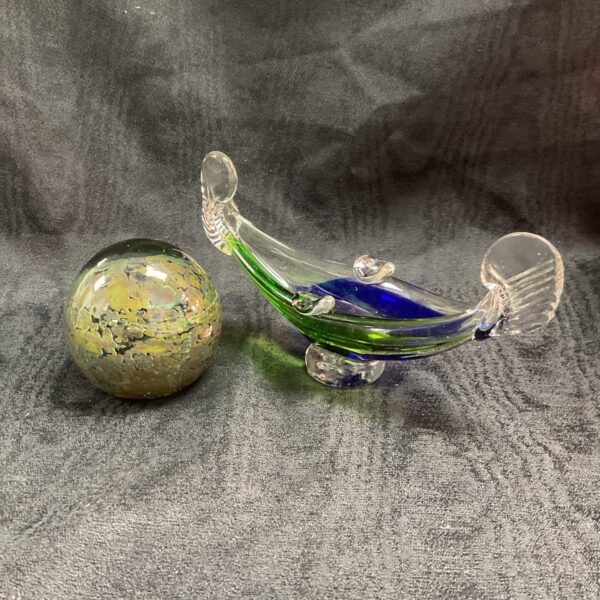 Vibrant Murano glass gondola sculpture, a beautiful Italian art piece.